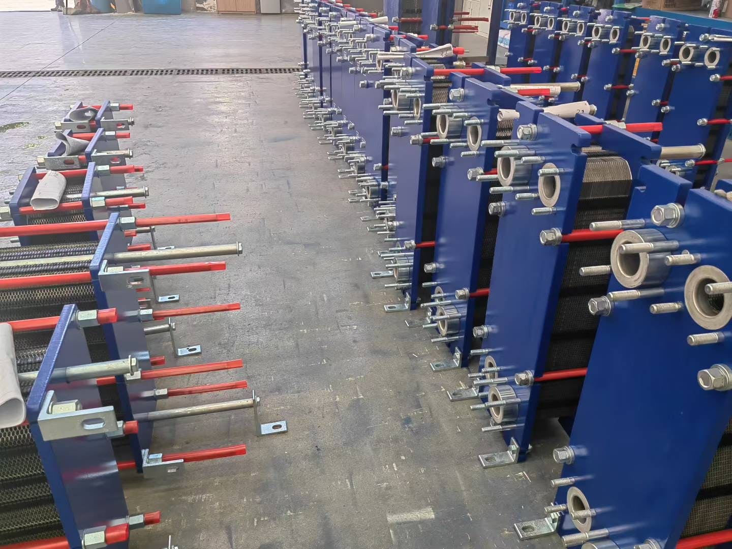 A gasketed heat exchanger next to a brazed one